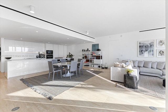 living room with light hardwood / wood-style floors