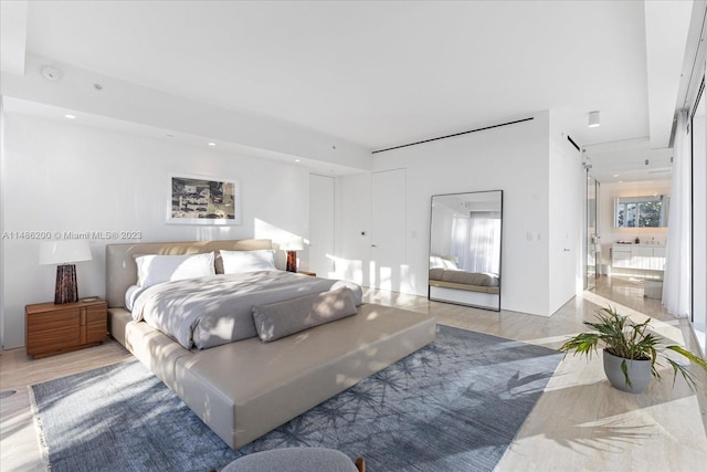 bedroom featuring light hardwood / wood-style flooring