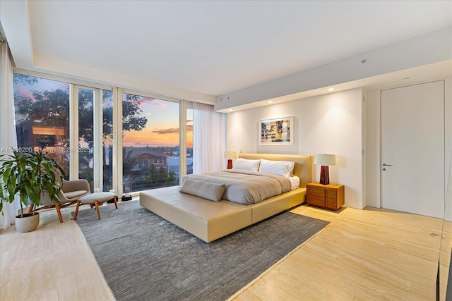 bedroom with light hardwood / wood-style floors