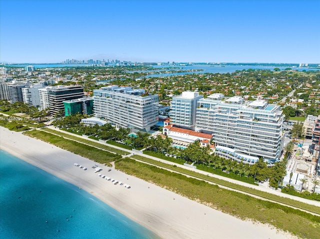 drone / aerial view with a view of the beach and a water view