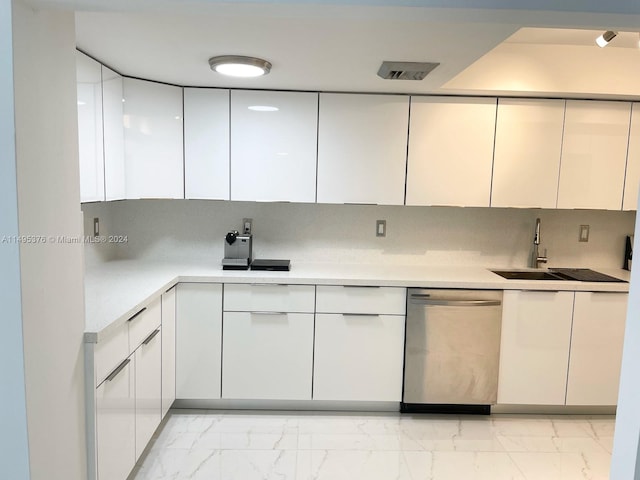 kitchen with white cabinetry, tasteful backsplash, sink, dishwasher, and light tile patterned floors