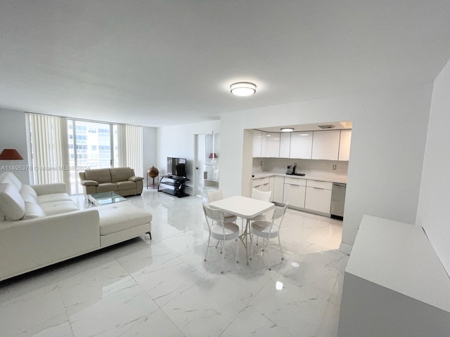 tiled living room with expansive windows