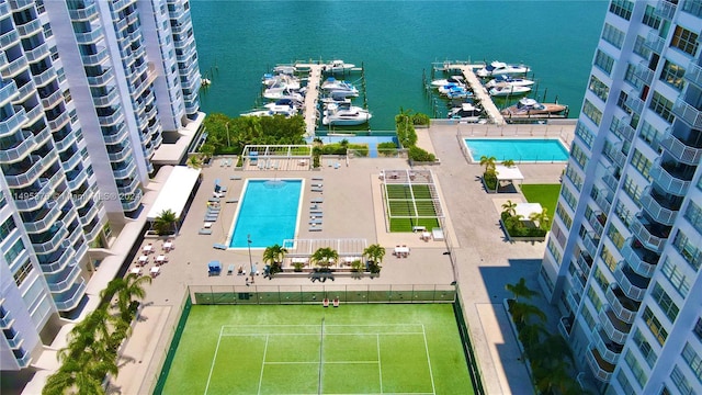 birds eye view of property featuring a water view