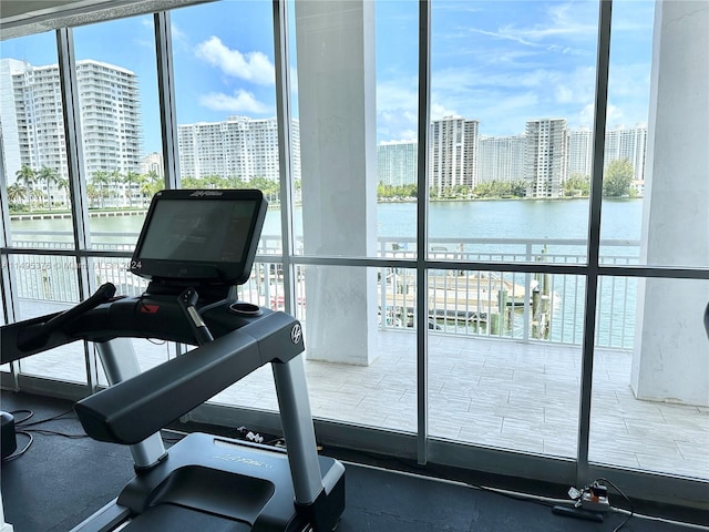 gym featuring a water view