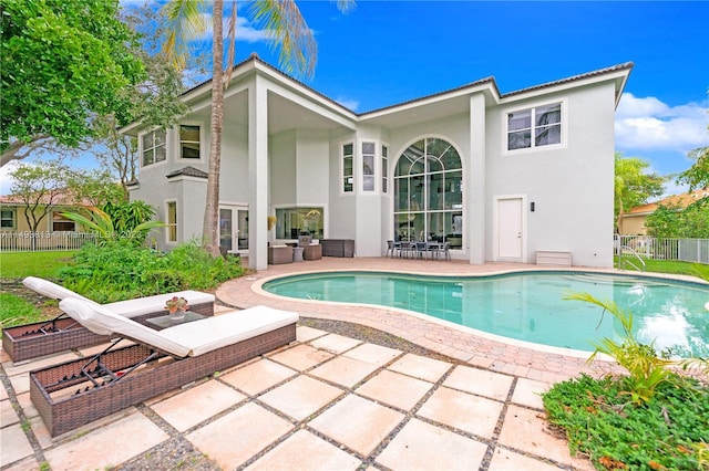 view of swimming pool featuring a patio area