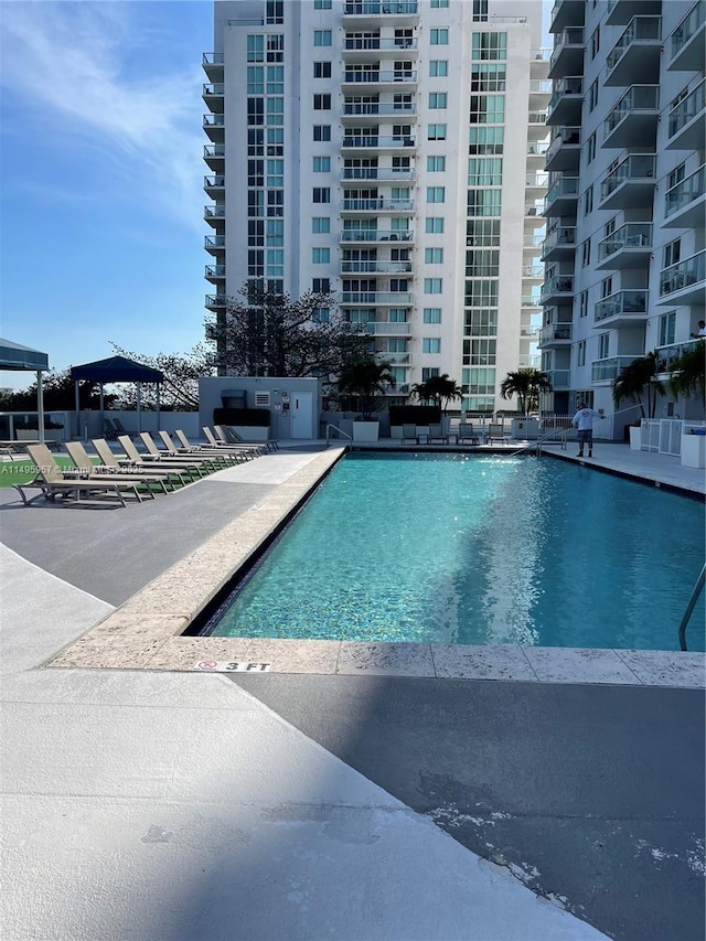 view of swimming pool featuring a patio