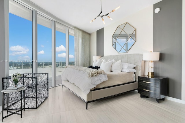 bedroom featuring a notable chandelier