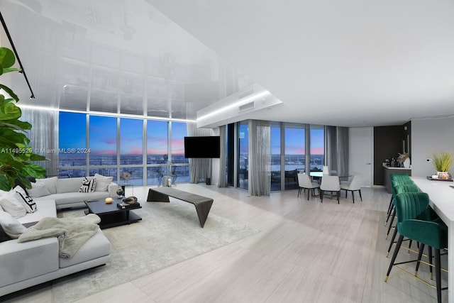 tiled living room with expansive windows