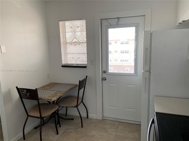 doorway to outside with a healthy amount of sunlight