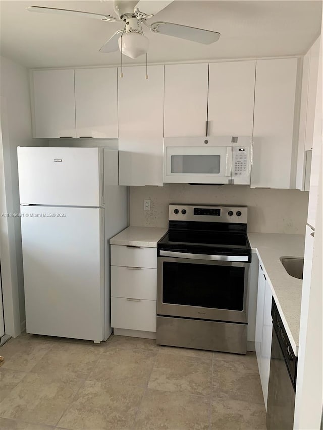 kitchen featuring white cabinetry, stainless steel appliances, and ceiling fan