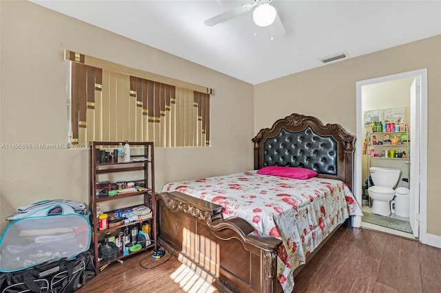 bedroom with dark hardwood / wood-style floors, connected bathroom, and ceiling fan