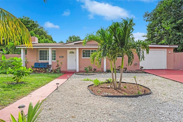 ranch-style home with a garage