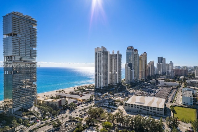 view of city with a water view and a view of the beach