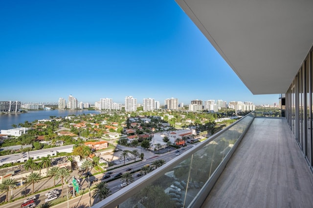 balcony featuring a water view