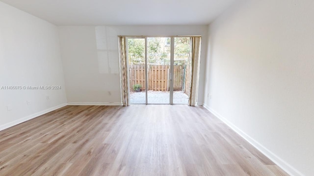 empty room featuring light hardwood / wood-style floors