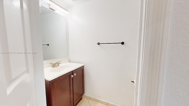 bathroom with vanity and tile patterned floors