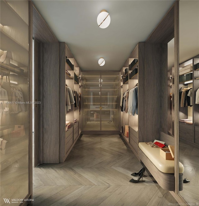 spacious closet with parquet floors