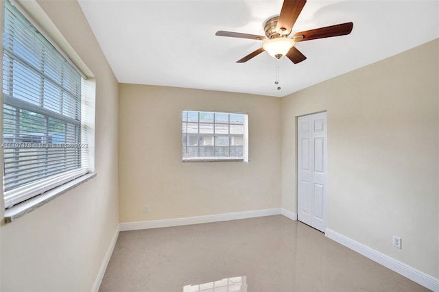 empty room featuring ceiling fan