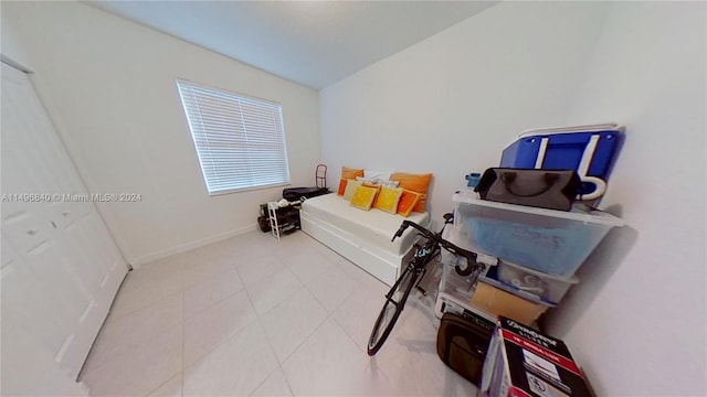 interior space featuring light tile floors