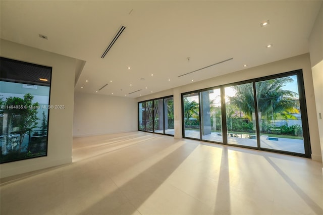 spare room with visible vents and recessed lighting