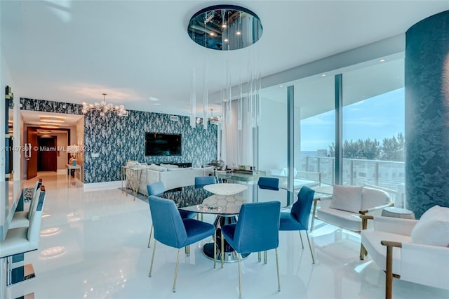 dining area featuring a notable chandelier