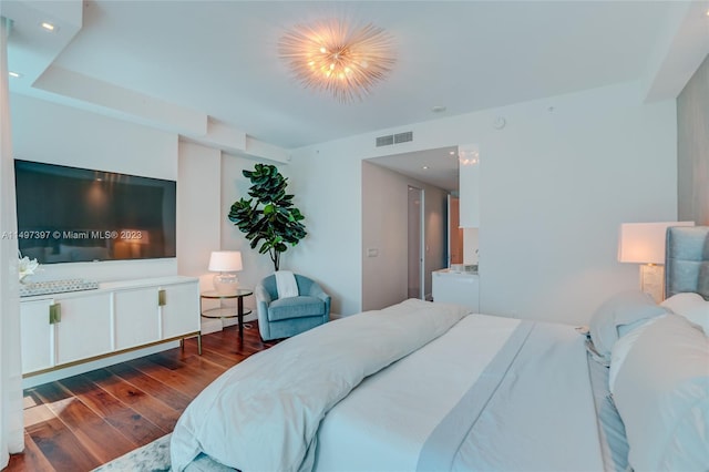 bedroom featuring wood-type flooring