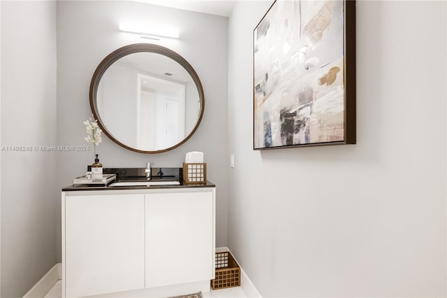 bathroom featuring tile patterned floors and vanity