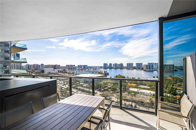 balcony featuring a water view