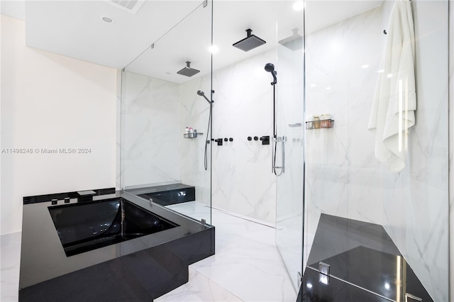 bathroom with tiled shower