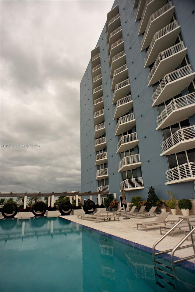 community pool featuring a patio
