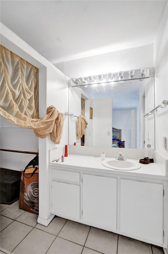 bathroom featuring tile patterned floors and vanity