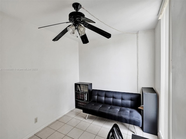 interior space featuring ceiling fan and light tile patterned flooring