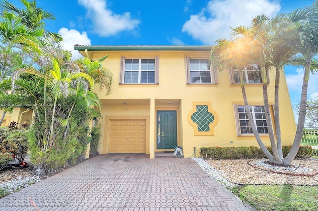 view of front of property featuring a garage