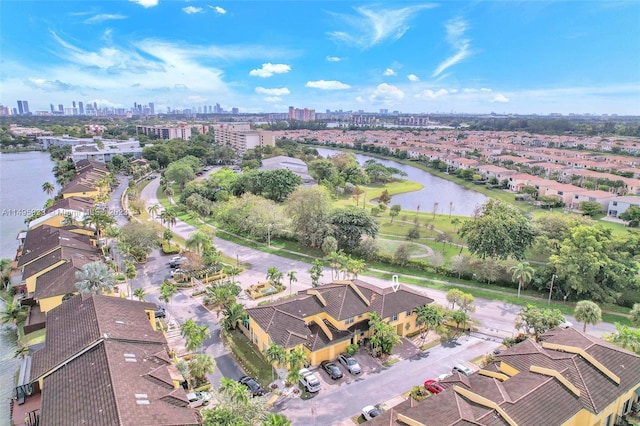 drone / aerial view with a water view