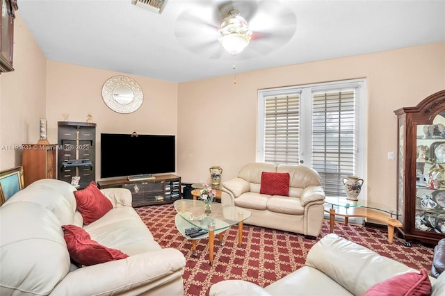 living room with ceiling fan