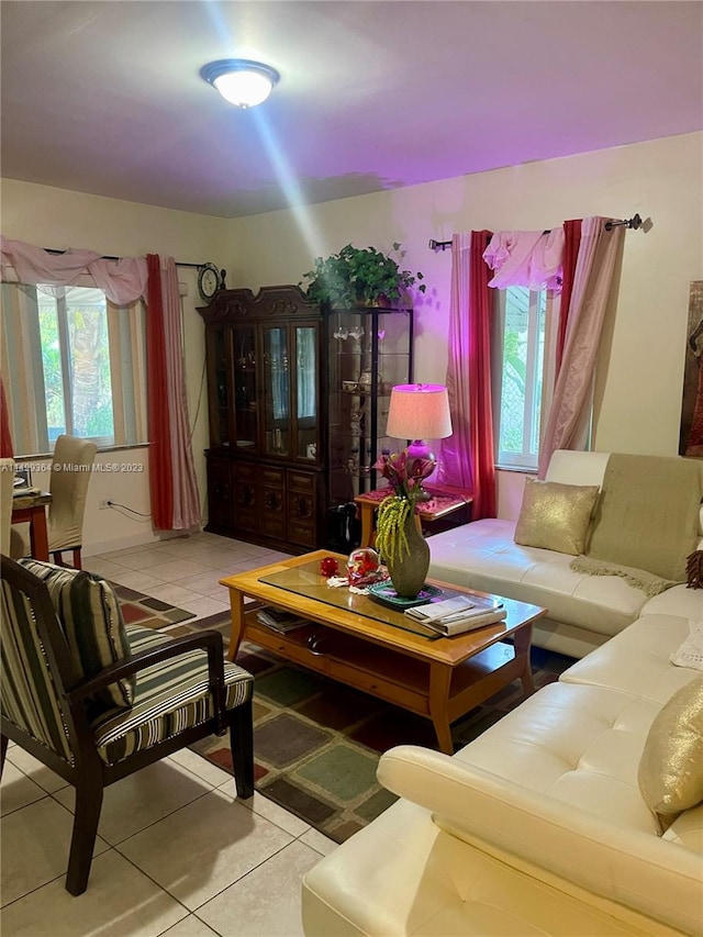 living room featuring light tile floors