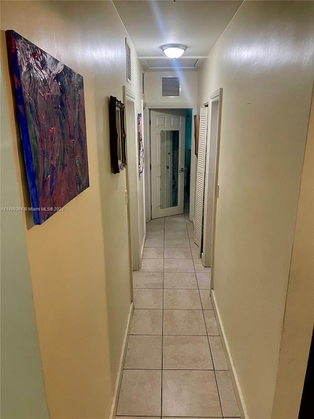 hallway with light tile flooring