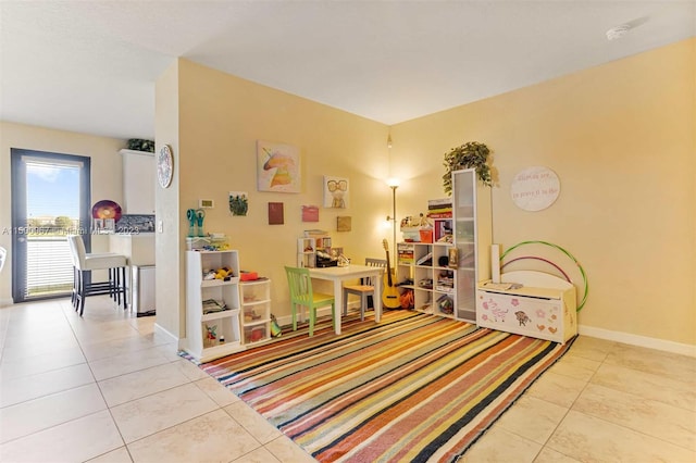 playroom with light tile patterned flooring