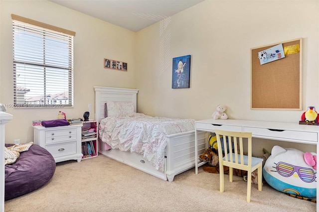 bedroom with light carpet