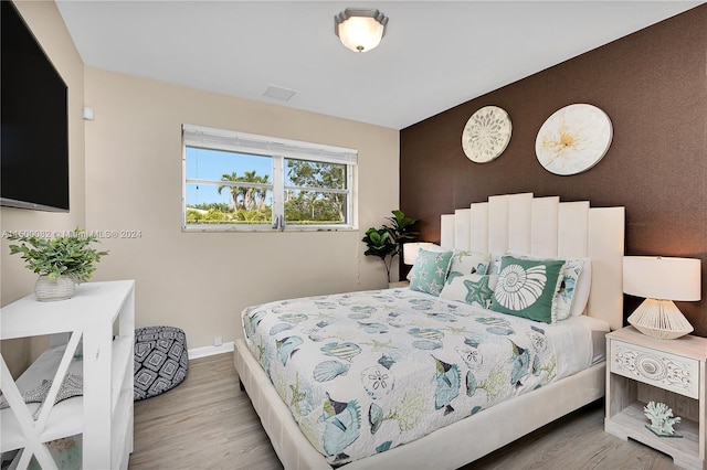 bedroom featuring light wood-type flooring