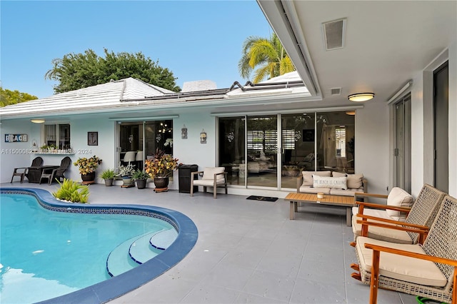 rear view of property with a patio