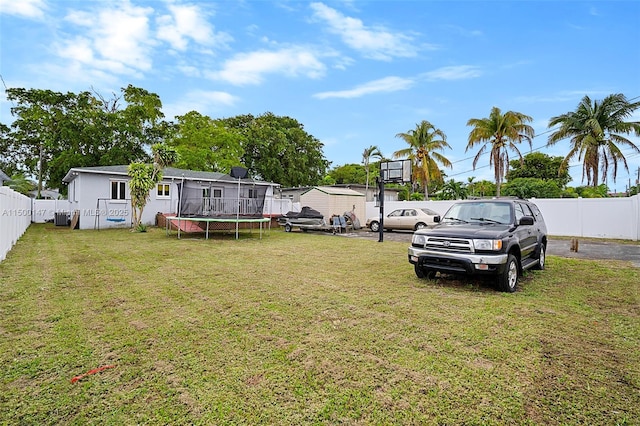 view of yard featuring a trampoline