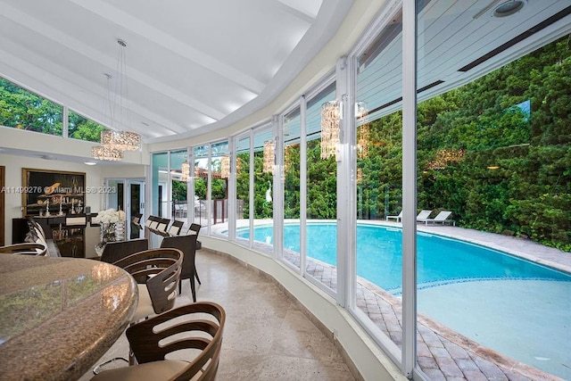 view of pool with french doors