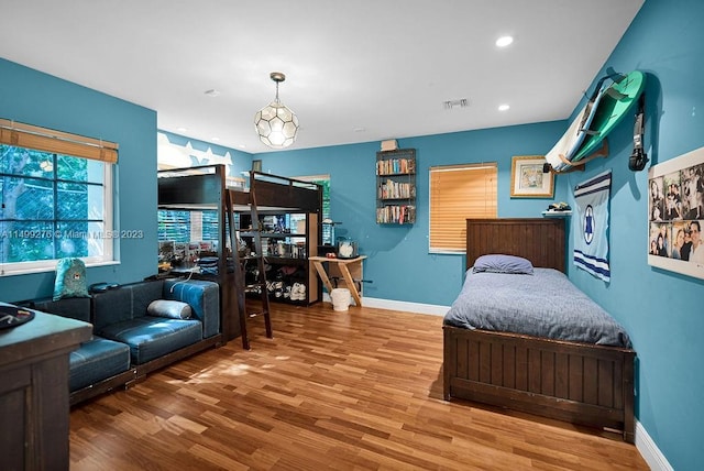 bedroom featuring hardwood / wood-style flooring