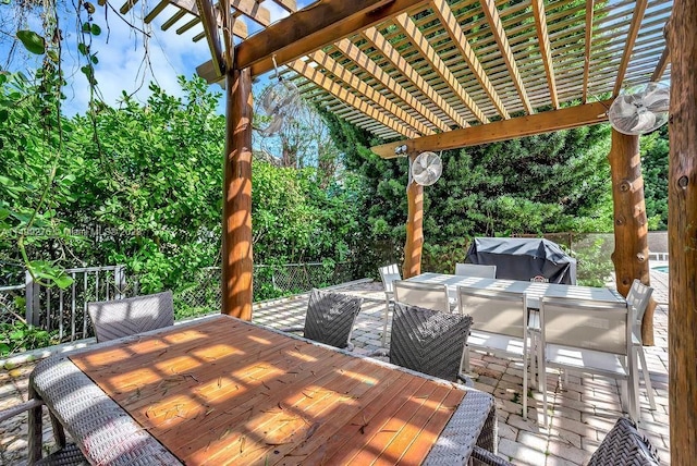 deck featuring a pergola and grilling area