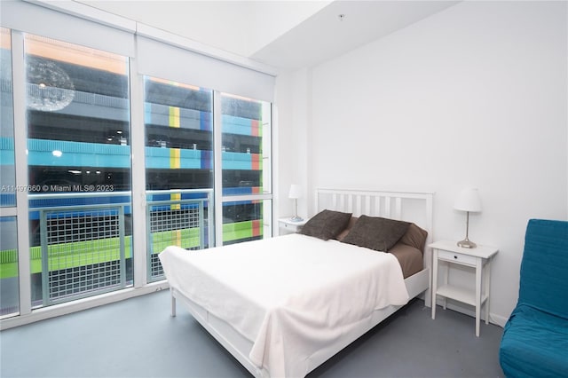 bedroom featuring multiple windows