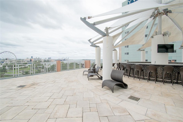 view of patio with a bar