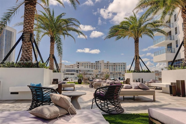 4010 S Ocean Dr Unit R2106, Hollywood, FL 33019 - view of patio / terrace with outdoor lounge area and a city view