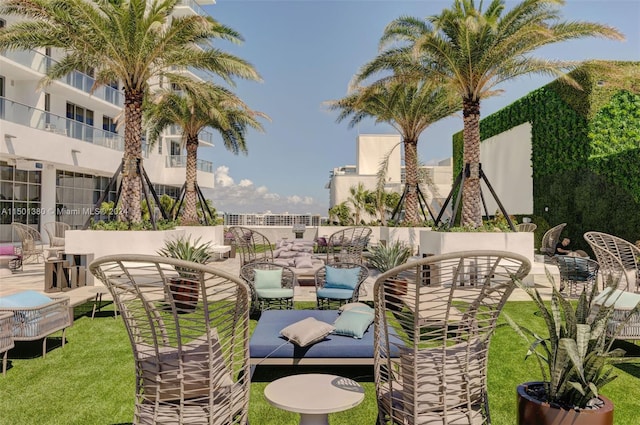 view of patio featuring a balcony