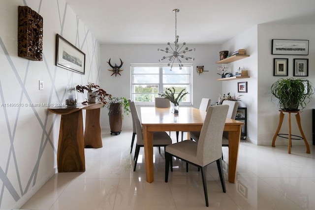 tiled dining area with a chandelier